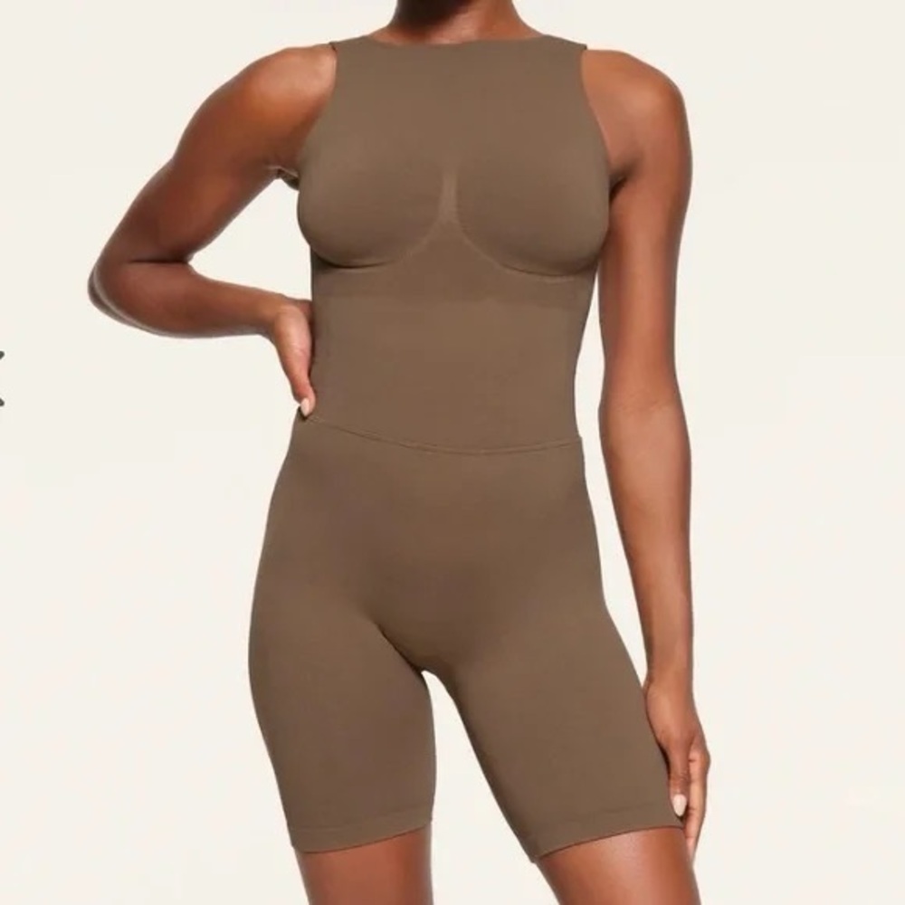 Skims Recycled Nylon Onesie in Oxide